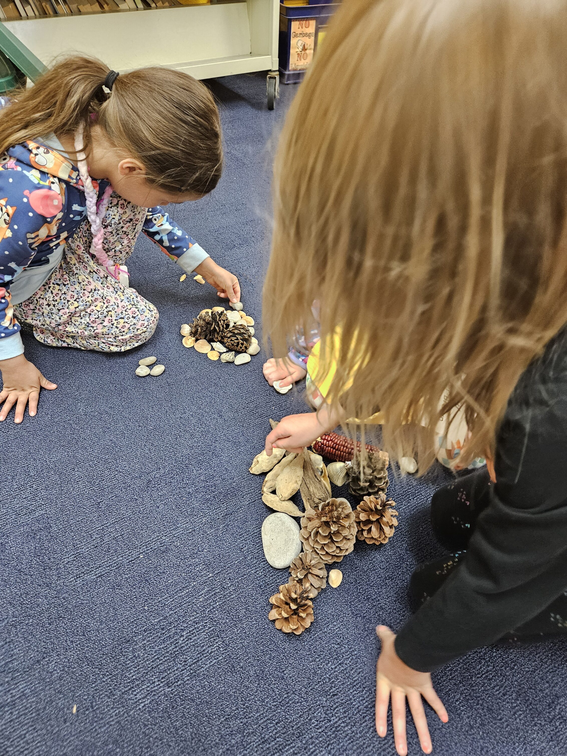 image of children building fairy houses during religious education class